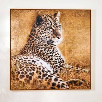 Framed artwork of a leopard on a textured brown background