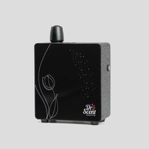 A black Dr. Scent air freshener with a modern design, featuring a floral graphic and stars on the front.