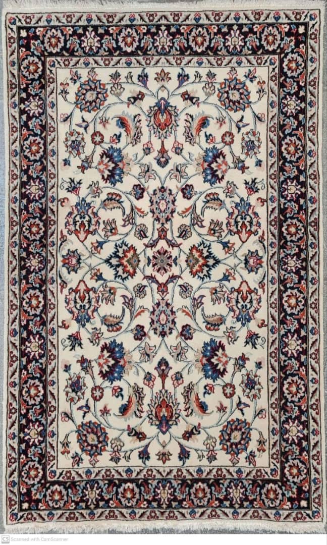 Decorative rug with intricate floral pattern on a white background