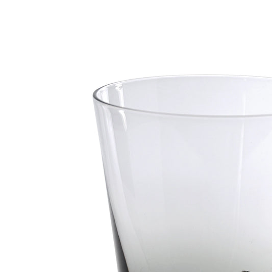 Clear glass tumbler on a white background