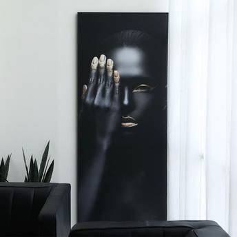 Abstract art piece with a hand covering a face on a black background
