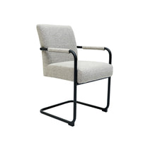 Chair with gray cushioned seat and backrest on a white background