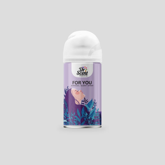 Deodorant spray bottle with a purple label on a gray background