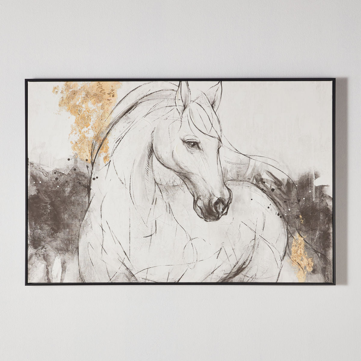 Framed artwork of a horse on a plain wall