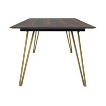 Wooden table with brass legs on a white background