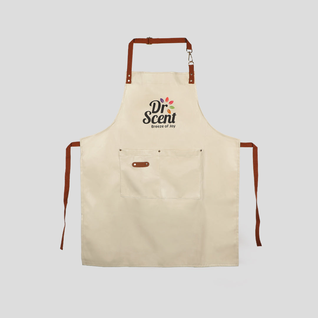 A beige kitchen apron with brown straps and pockets, featuring the 'Dr. Scent' logo on the front.