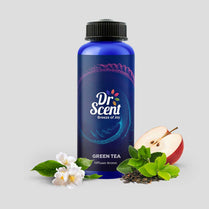 Dr. Scent Green Tea diffuser aroma bottle with apple, leaves, and flowers on a gray background