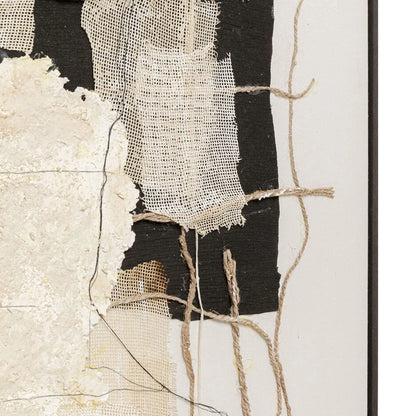 Textured fabric with black, white, and beige patterns on a white background
