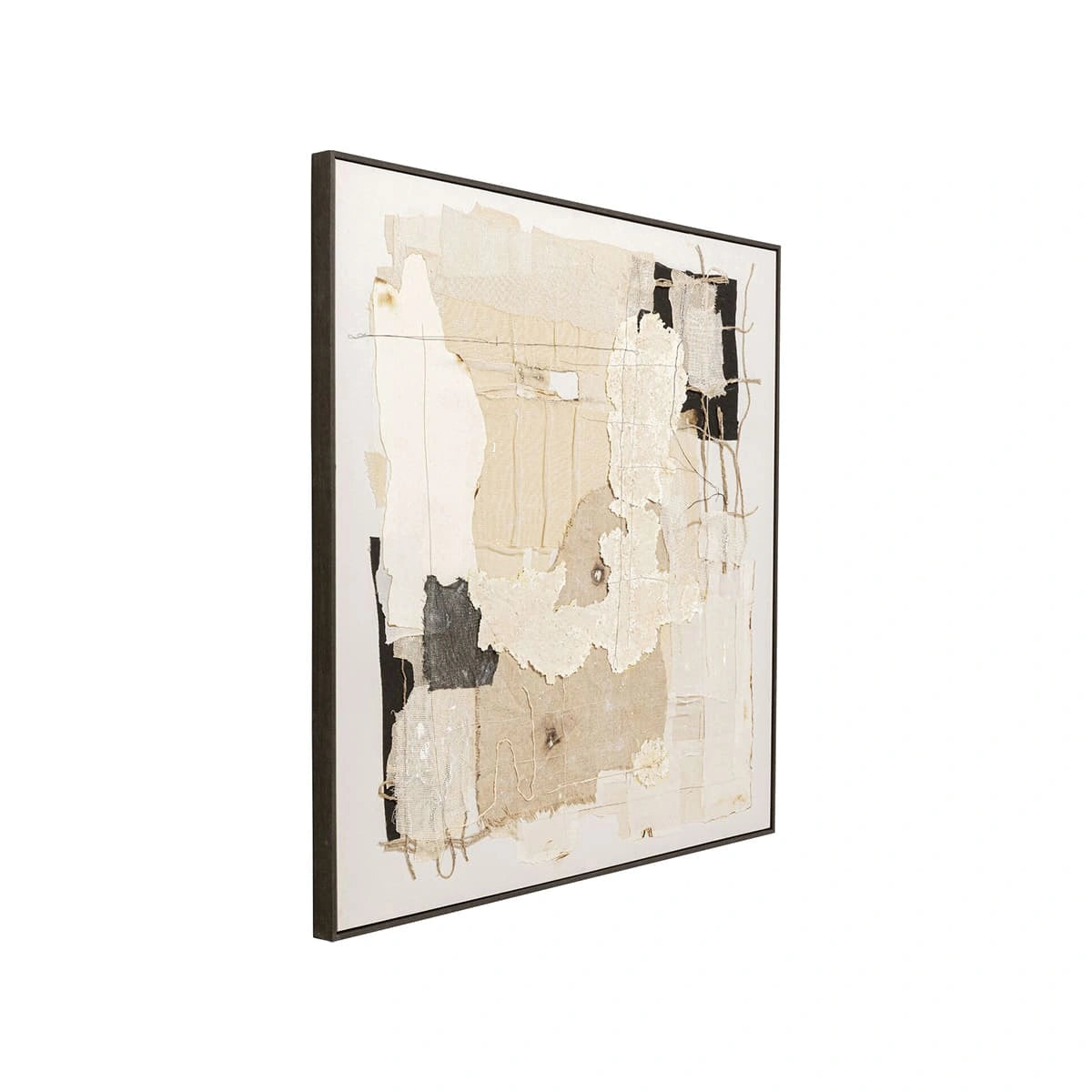 Framed abstract art piece with black, white, and beige tones on a white background