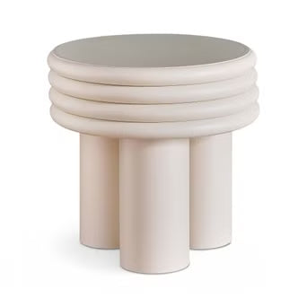 Round side table with cylindrical legs on a white background