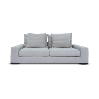 Gray sofa with cushions on a white background