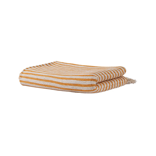 Folded striped blanket with yellow and white stripes on a white background