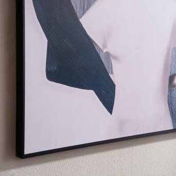 Framed abstract art piece on a wall