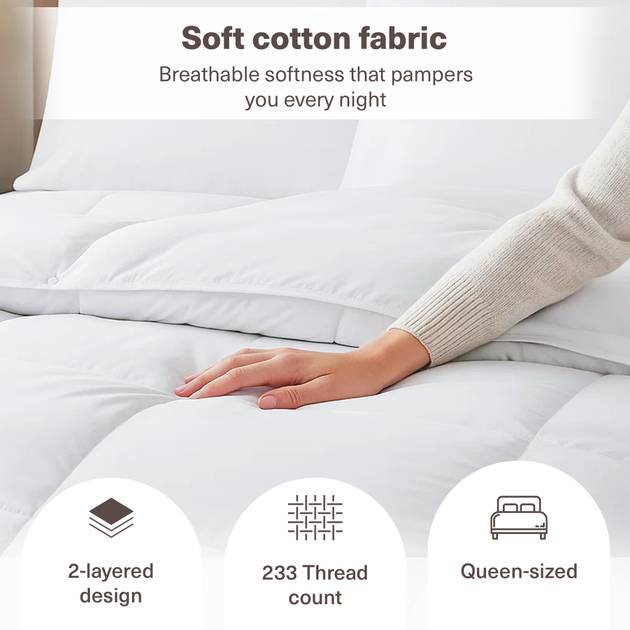 White comforter on a bed with text highlighting soft cotton fabric, breathable softness, 2-layered design, 233 thread count, and queen-sized size.