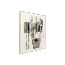 Abstract art piece with black and white patterns in a gold frame on a white background