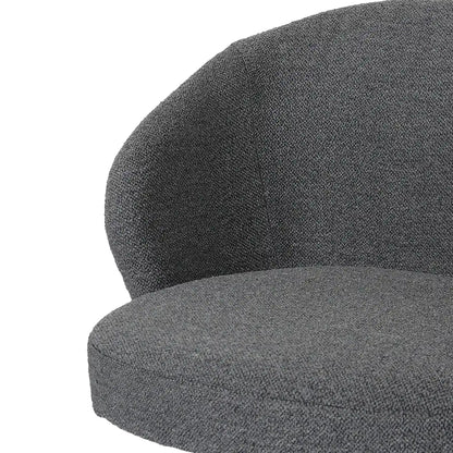 Close-up of a textured gray cushion on a white background