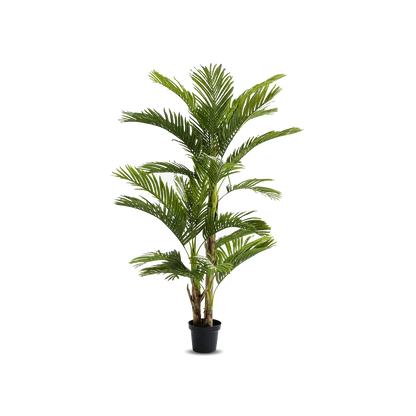 Potted artificial palm tree on a white background