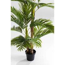 Potted artificial palm tree on a white background