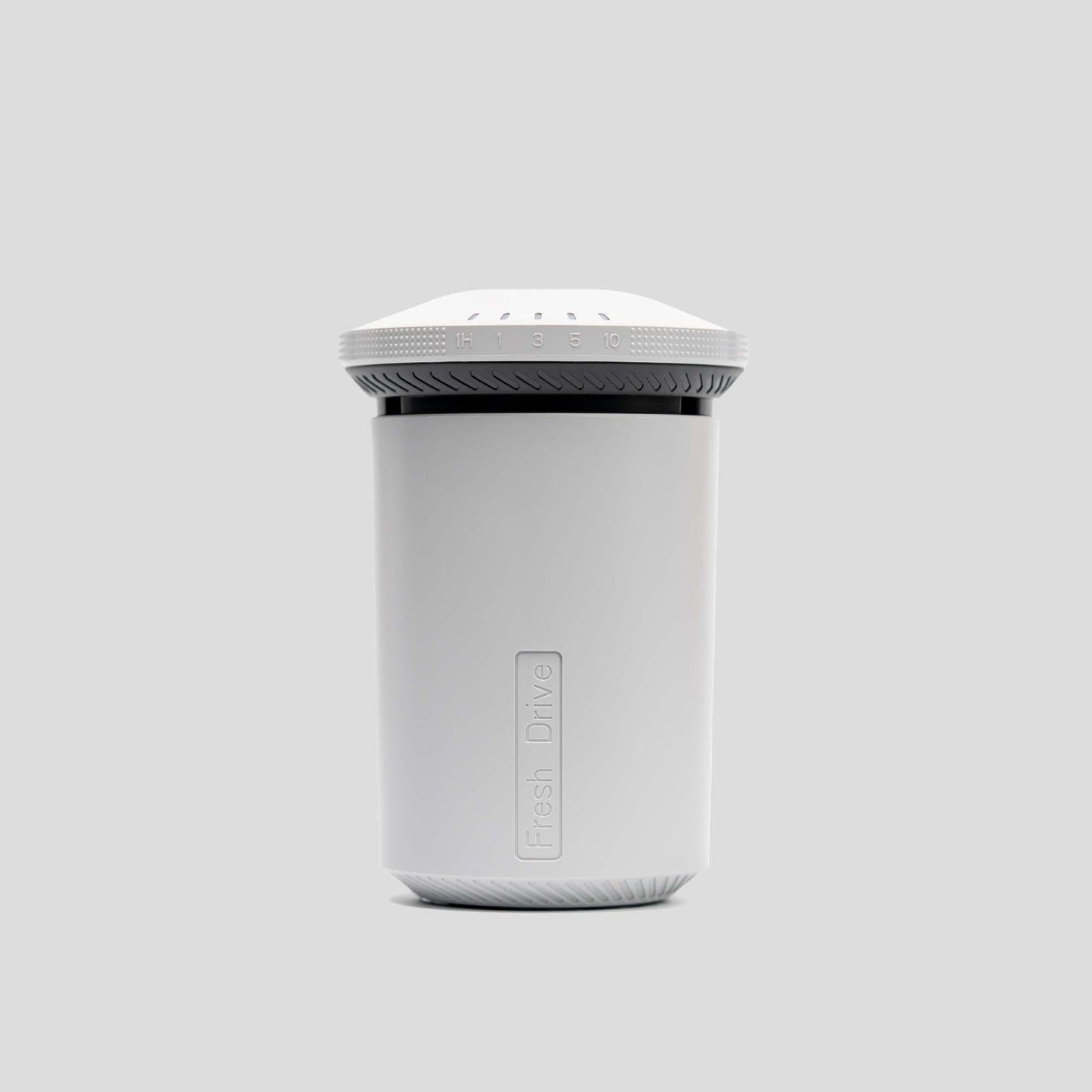 White cylindrical container with a lid on a light gray background