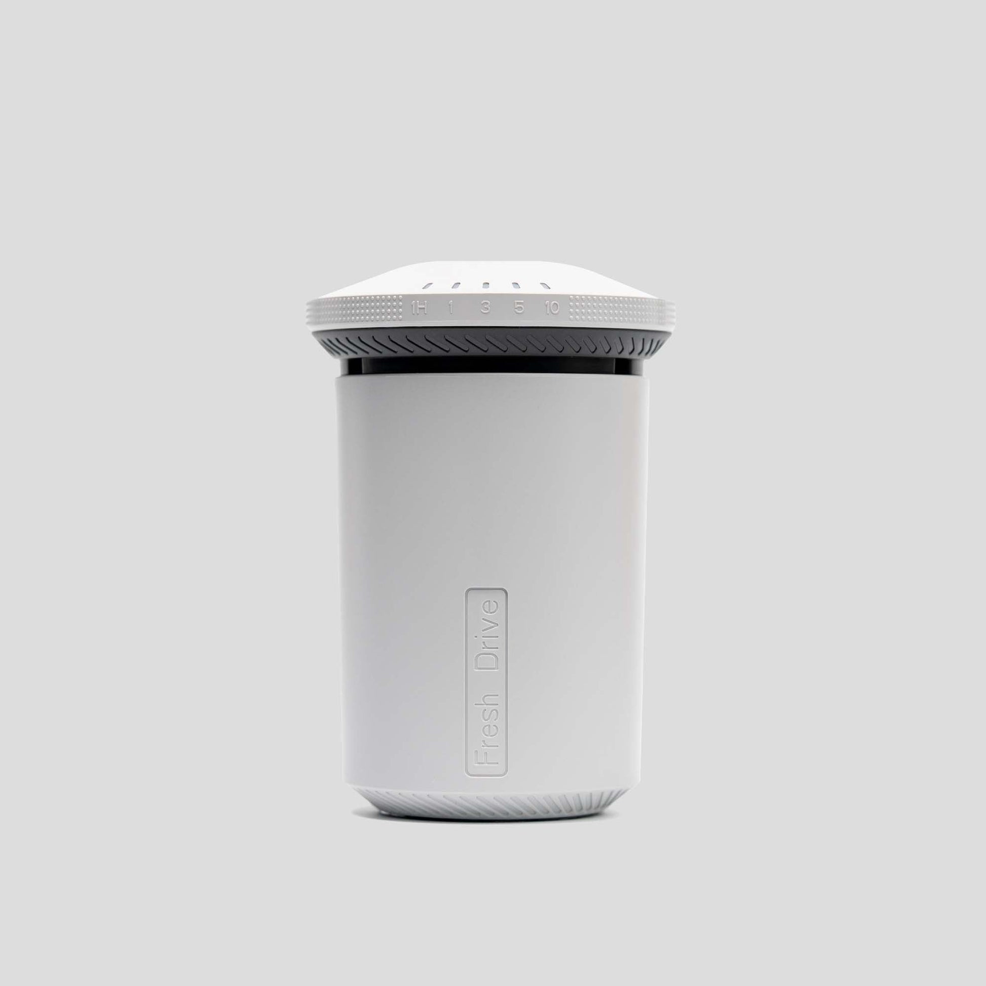 White cylindrical container with a lid on a light gray background