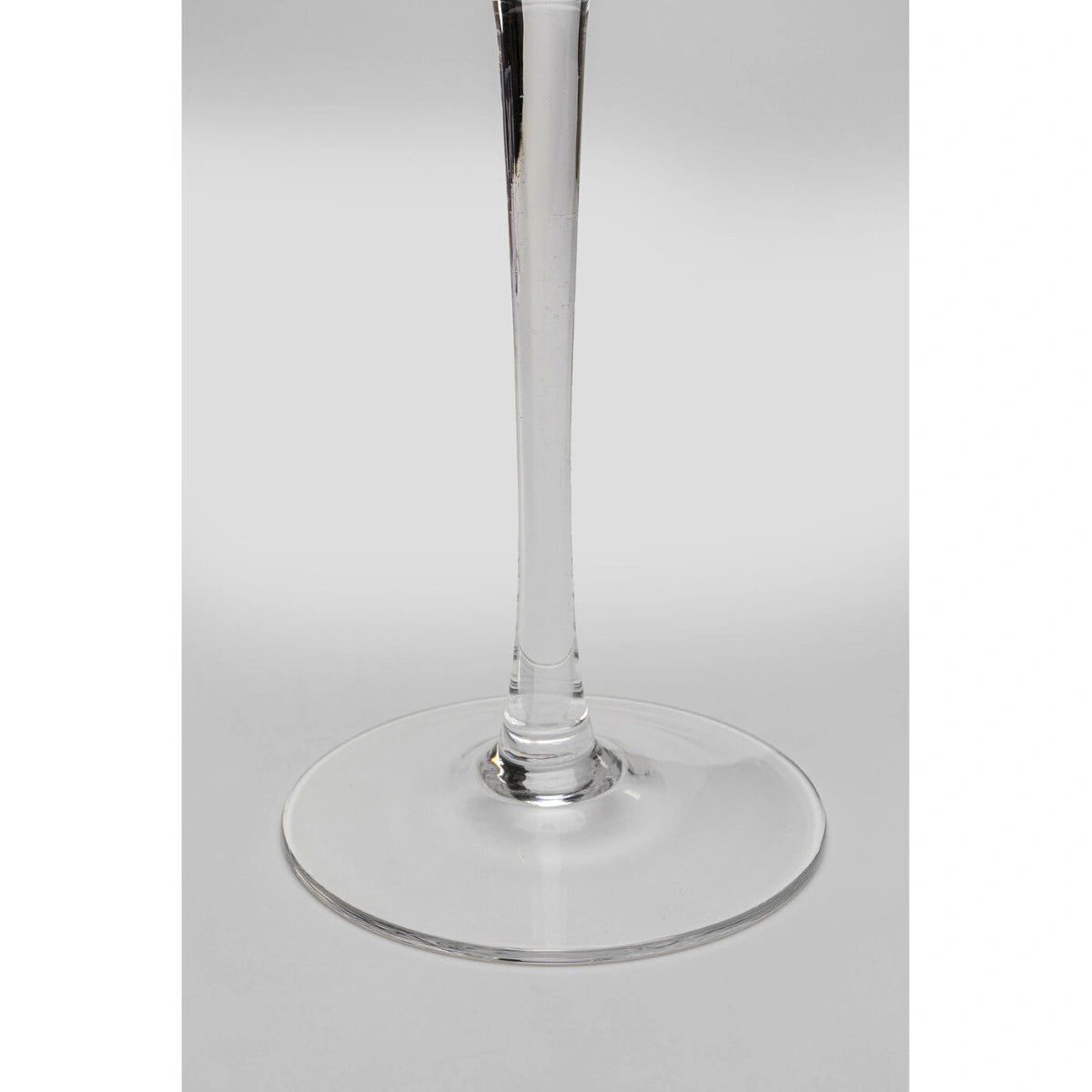 Clear wine glass on a white background