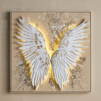 Decorative wall art with white angel wings on a beige background