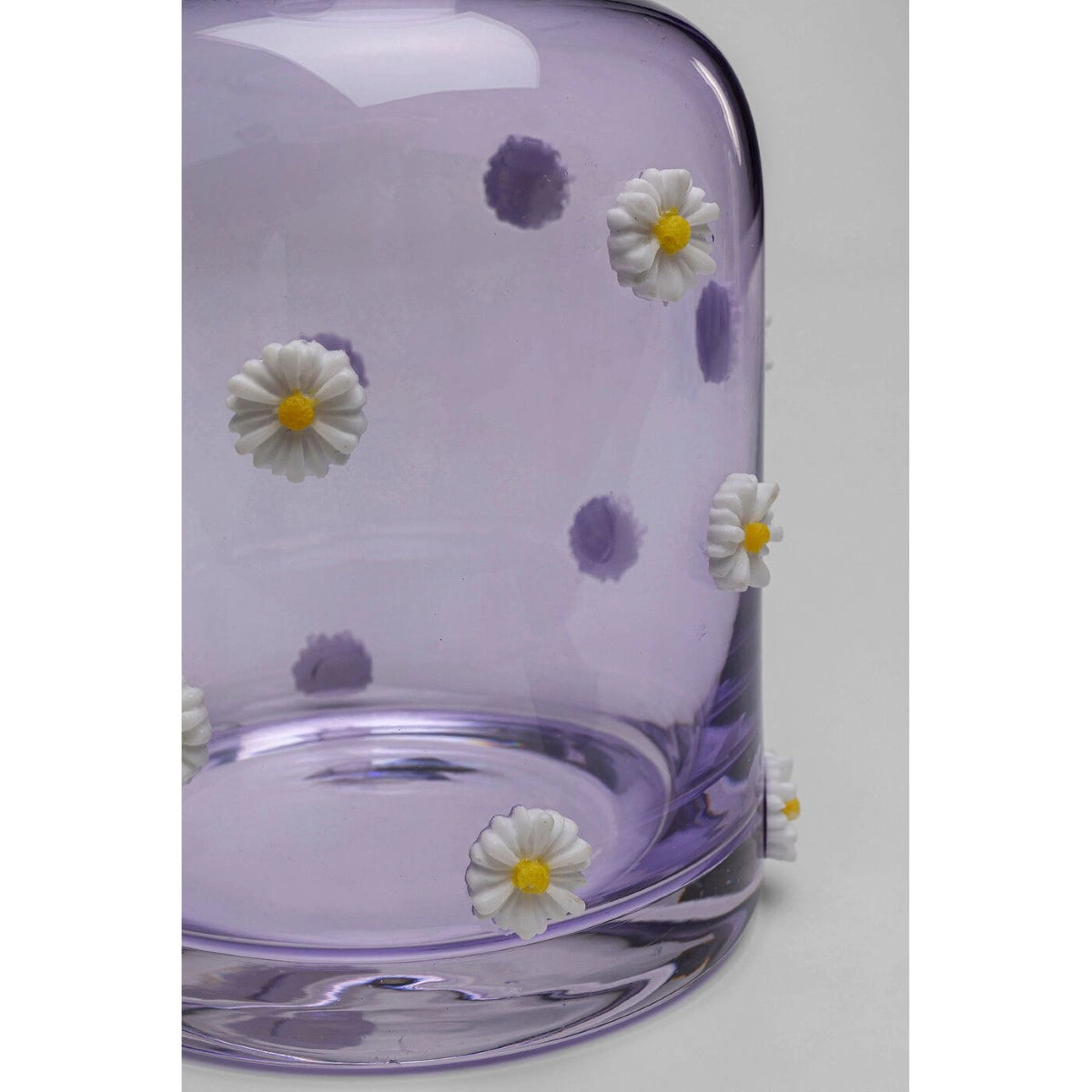 Glass dish with floral decorations on a white background