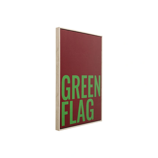 Red sign with green text 'GREEN FLAG' on a white background