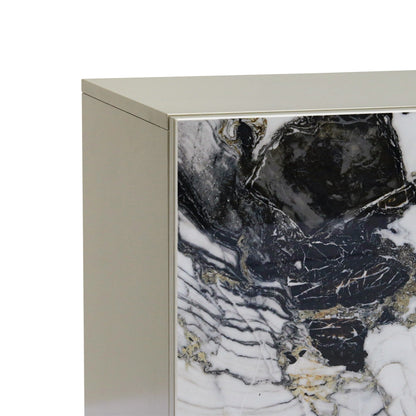 Close-up of a cabinet with marble-patterned door and beige frame.