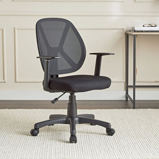 Black office chair in a room with a desk and decor.