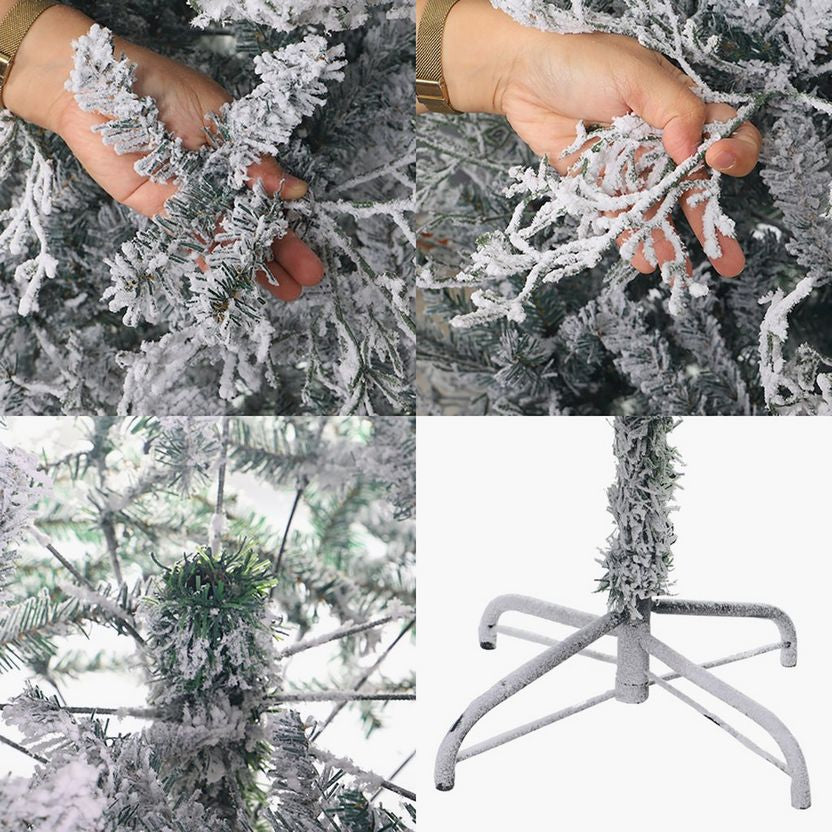 Frosted Christmas tree branches held by a hand, with a stand and additional branches in the background.
