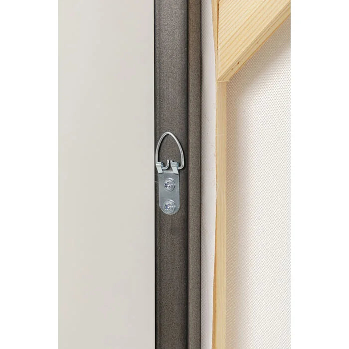 Close-up of a door handle on a wooden door with a white background