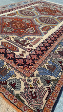 Close-up of a patterned rug with intricate designs- Luxury Rug Handmade Oriental Rug | Handmade in afghanistan – Bergamot | Luxury Living Room Décor
