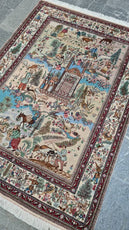 Decorative rug with intricate patterns and characters on a gray floor- Luxury Rug Handmade Persian Rug | Handmade in Iran – C-7 | Luxury Living Room Décor