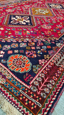 Close-up of a colorful patterned rug with intricate designs- Luxury Rug Handmade Persian Rug | Handmade in Iran – Shiraz | Luxury Living Room Décor
