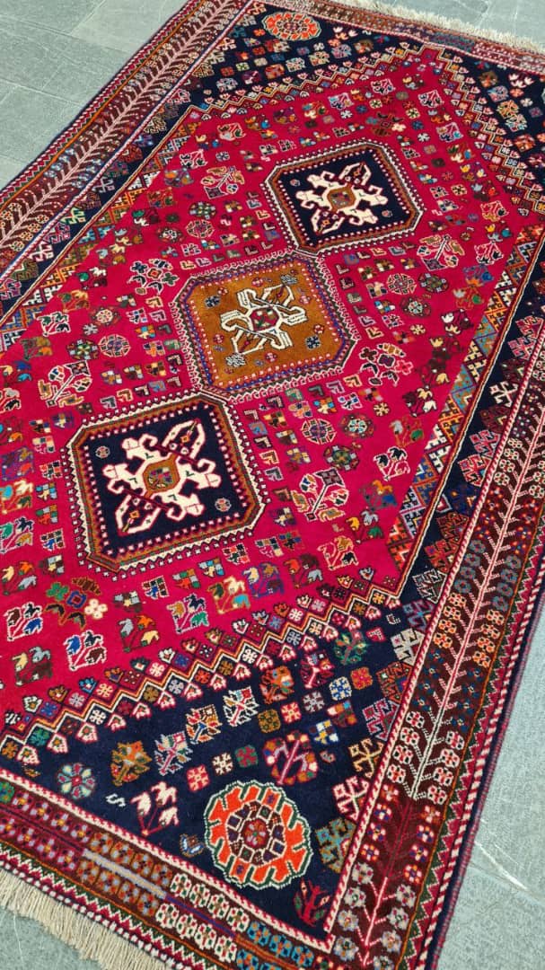 Decorative rug with intricate patterns on a plain background- Luxury Rug Handmade Persian Rug | Handmade in Iran – Shiraz | Luxury Living Room Décor