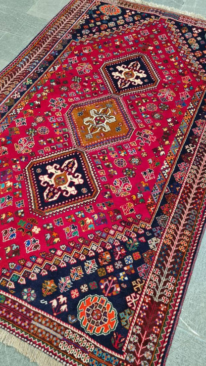 Decorative rug with intricate patterns on a plain background- Luxury Rug Handmade Persian Rug | Handmade in Iran – Shiraz | Luxury Living Room Décor