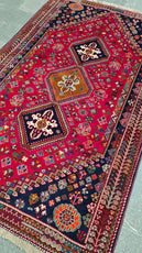 Decorative rug with intricate patterns on a plain background- Luxury Rug Handmade Persian Rug | Handmade in Iran – Shiraz | Luxury Living Room Décor