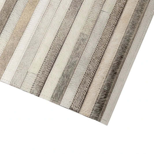 Close-up of a textured rug with horizontal stripes on a white background