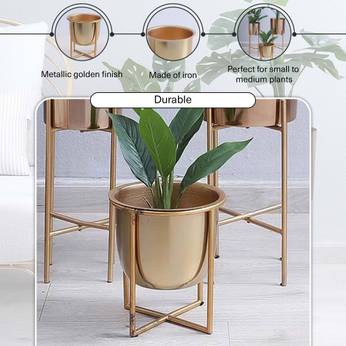 Gold plant pot with plant on a white surface, featuring text about material and use.