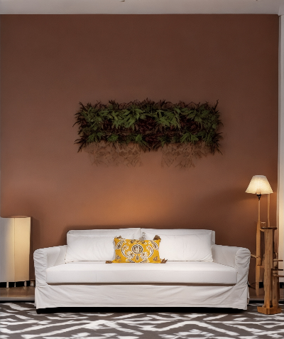 White sofa with a yellow pillow against a brown wall with decorative plants. Milano Collection Sofa – Clean Lines, Lasting Comfort | Vella Concept
