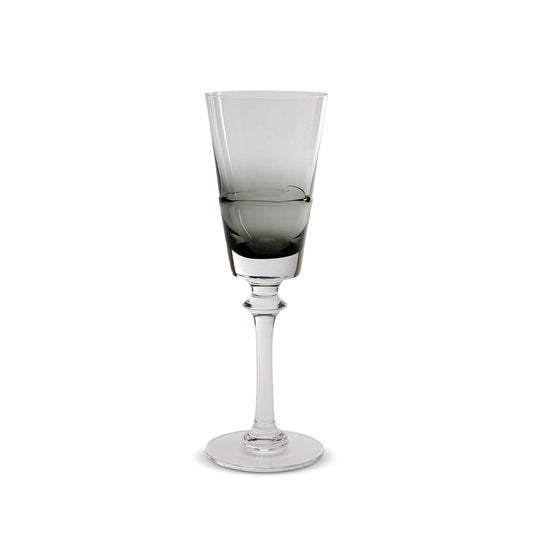 Clear glass with a stem on a white background