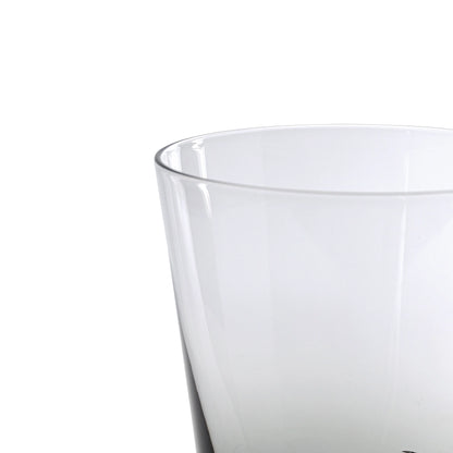 Clear glass tumbler on a white background