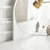 Modern interior design with a white wall, gold lamp, and decorative items- Moon Desk & Dresser with Mirror – Kids’ Room Furniture