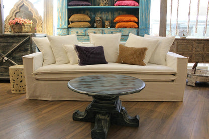 Beige sofa with decorative pillows in a living room setting. New York Collection Sofa – Live in the Now | Vella Concept