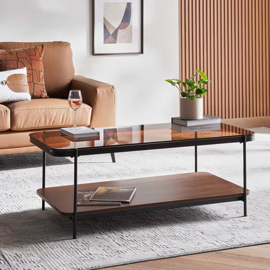 Modern living room with a coffee table, sofa, and decorative items- Nya Coffee Table – Brown Wood Finish