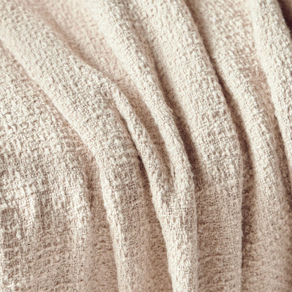 Close-up of beige textured fabric