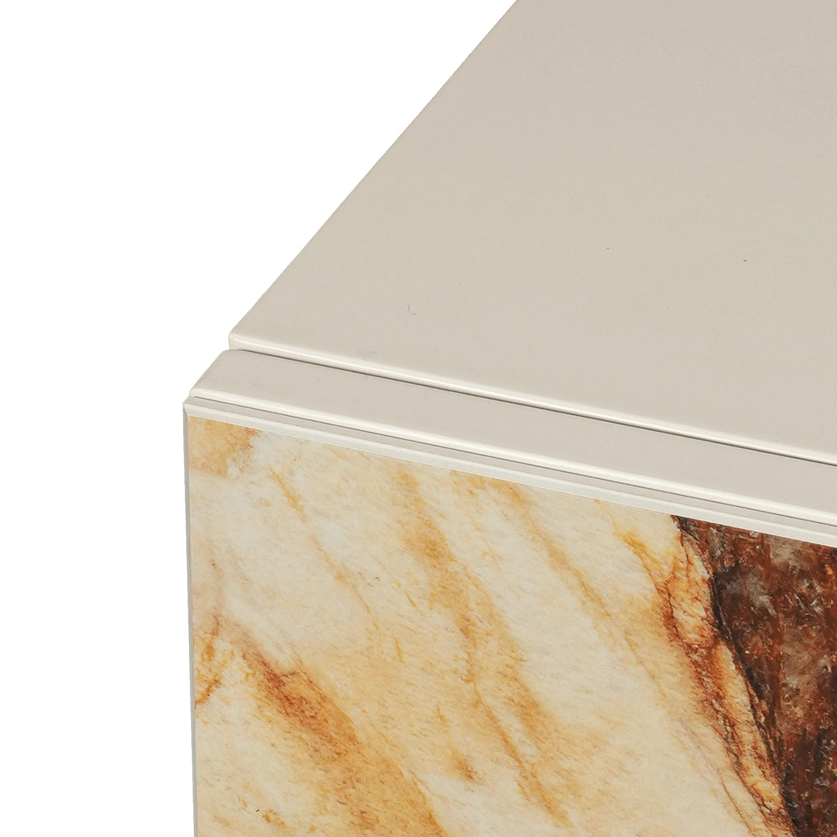 Marble-patterned container with metallic lid on a white background