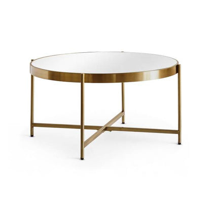 Round glass table with gold metal frame on a white background