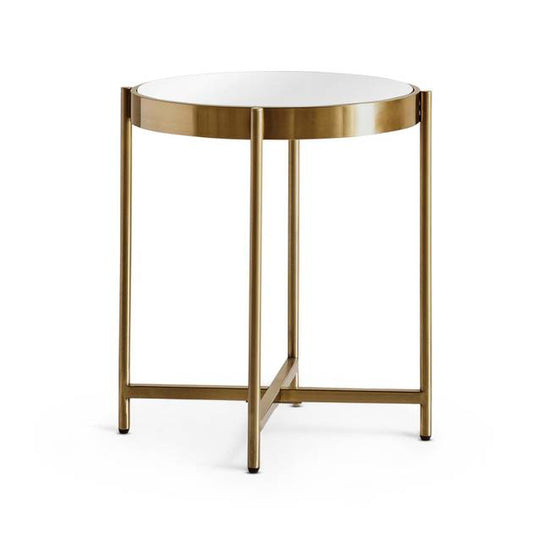 Small round table with a white top and gold metal frame on a white background